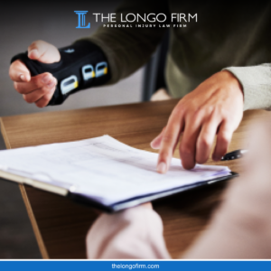 Personal injury victim reviewing paperwork after an accident in Colorado Springs caused by negligence