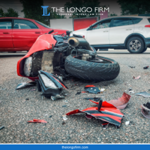 A motorcycle lying in the road surrounded by debris after a Colorado Springs motorcycle accident